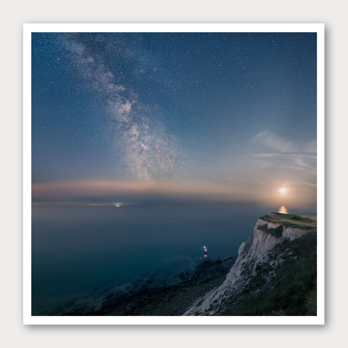 A photographic print of Beachy Head Milky Way, framed with a white border and shown against a light gray background.