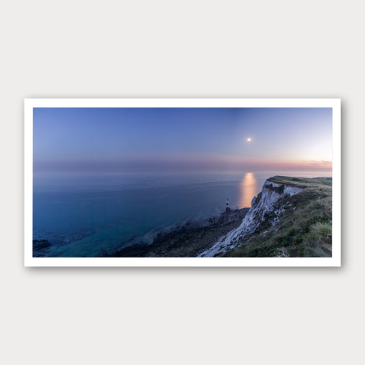 A photographic print of Beachy Head Moonrise, framed with a white border and shown against a light gray background.