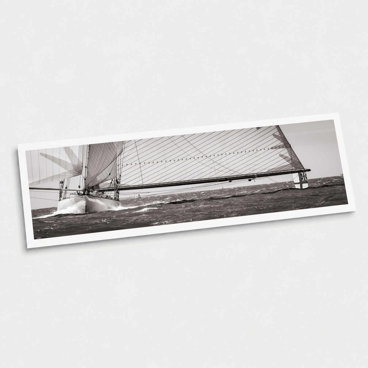 A photographic art print of Boom, displayed at an angle on a light gray background.