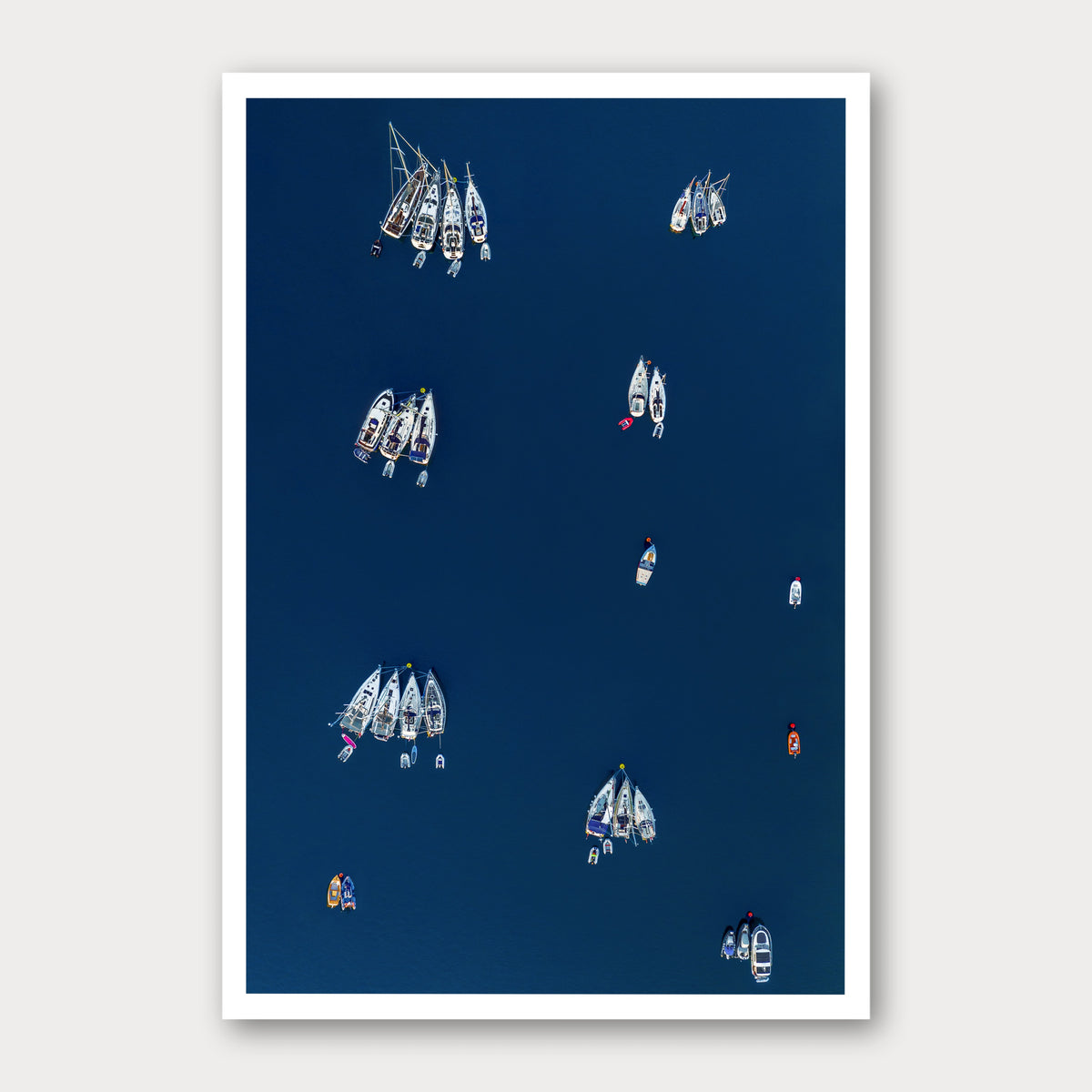 A photographic print of Bouy Magnet, framed with a white border and shown against a light gray background.
