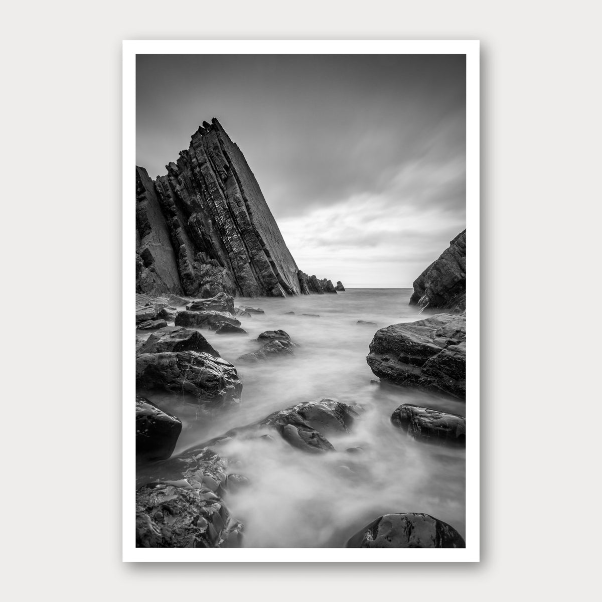 A black and white photographic print of Cloudy Waters, framed with a white border and shown against a light gray background.