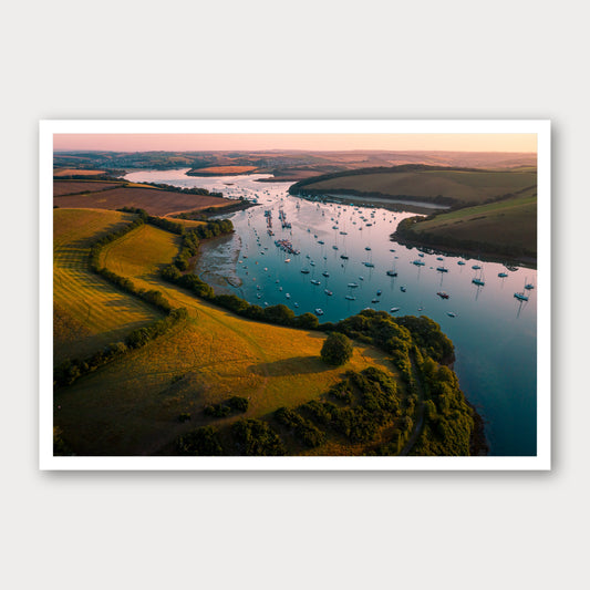 A photographic print of Golden Hour Anchorage, framed with a white border and shown against a light gray background.