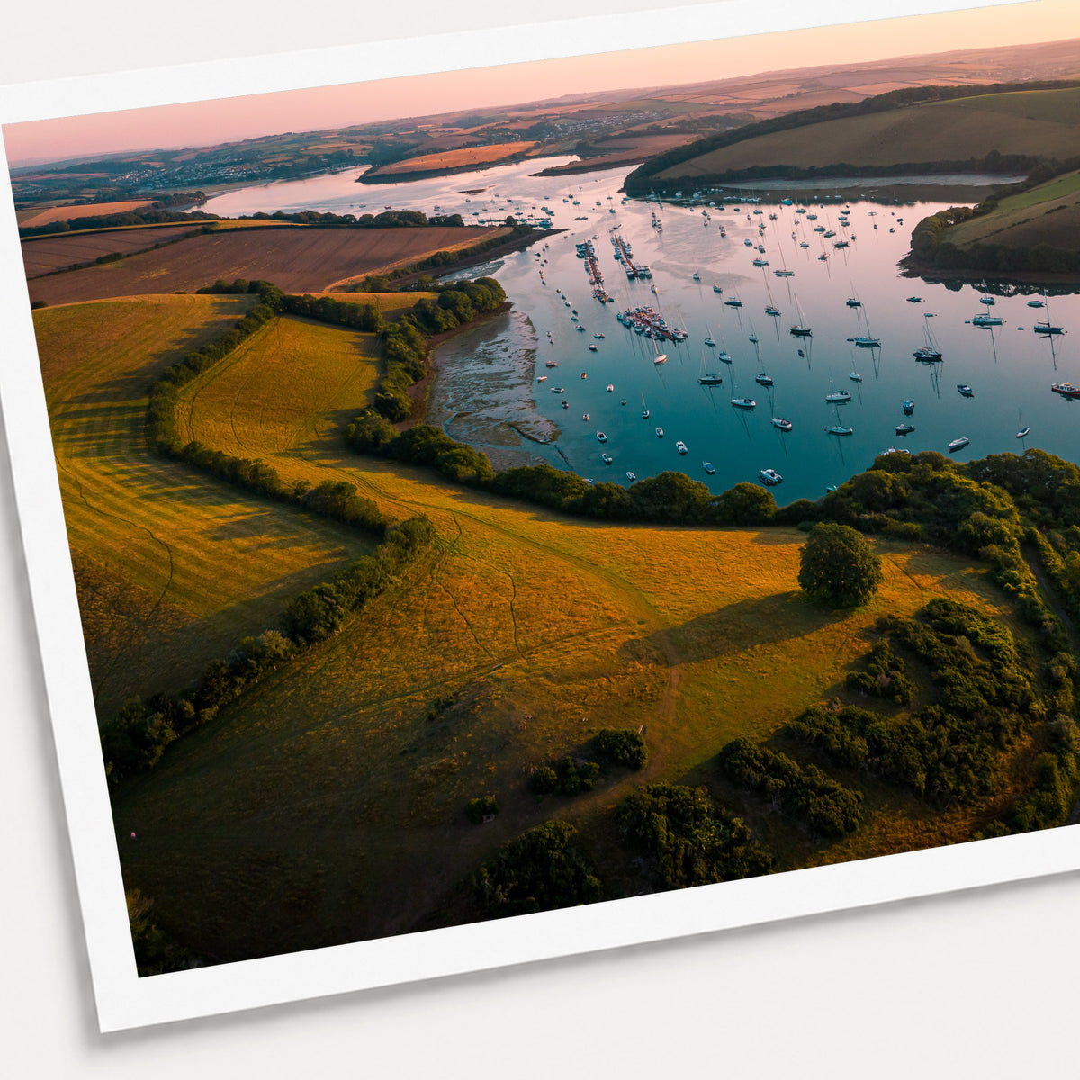 A photographic print of Golden Hour Anchorage, shown with a white border and angled presentation on a light background.