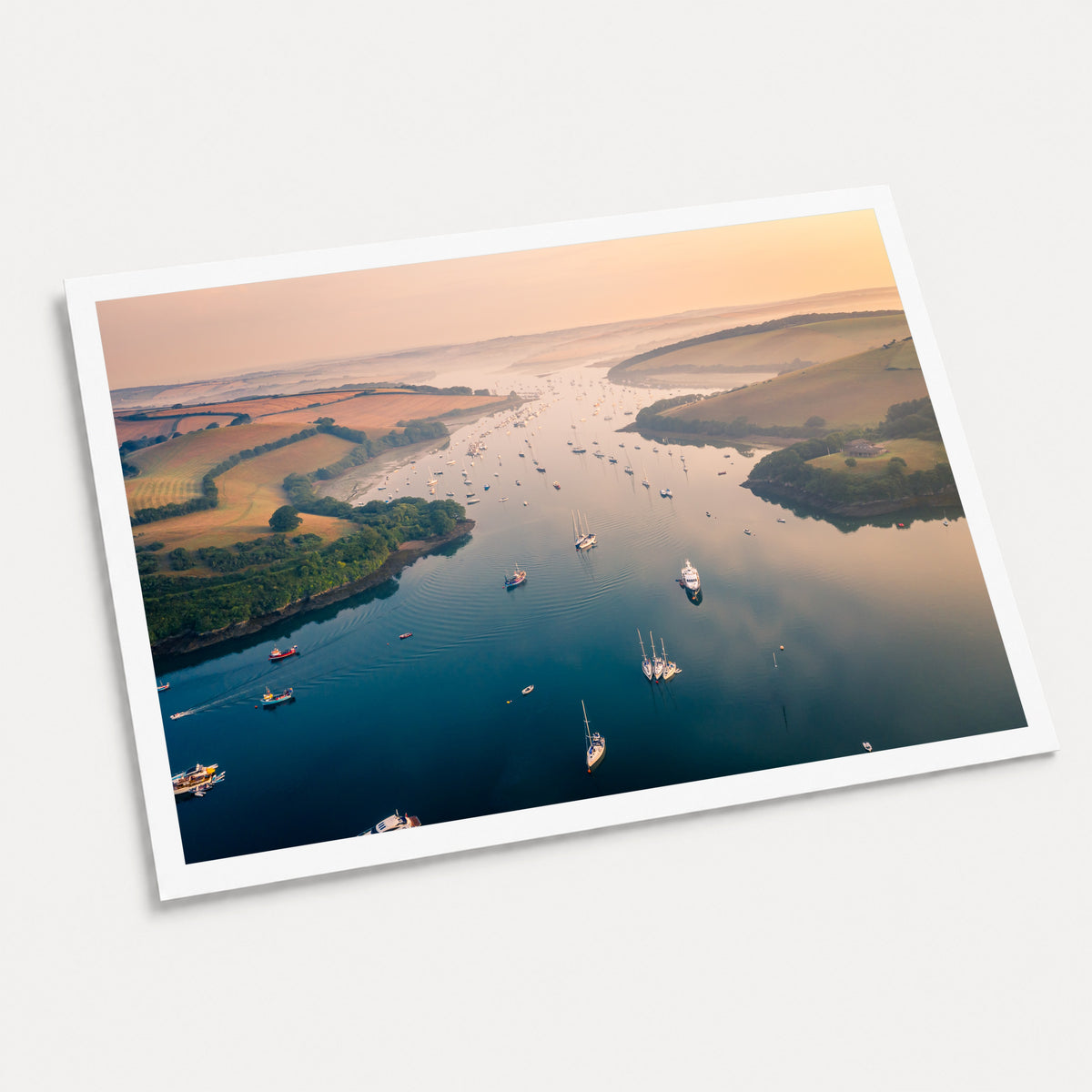 A photographic art print of Harbour Haze, displayed at an angle on a light gray background.