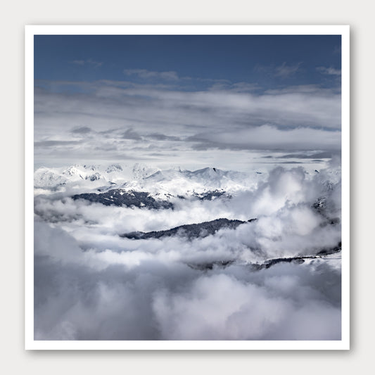 A photographic print of Islands in the Sky, framed with a white border and shown against a light gray background.