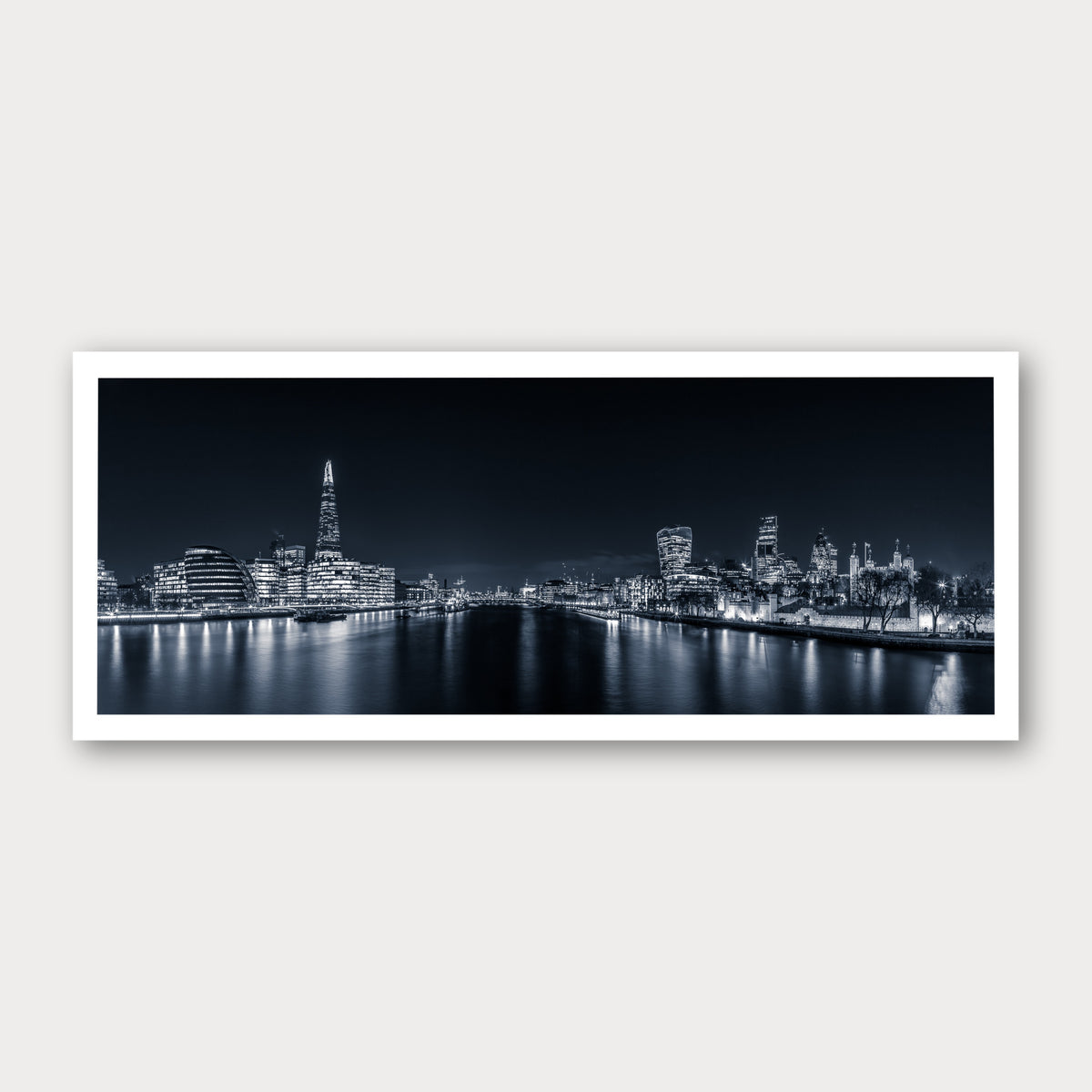 A photographic print of London Illuminated, framed with a white border and shown against a light gray background.