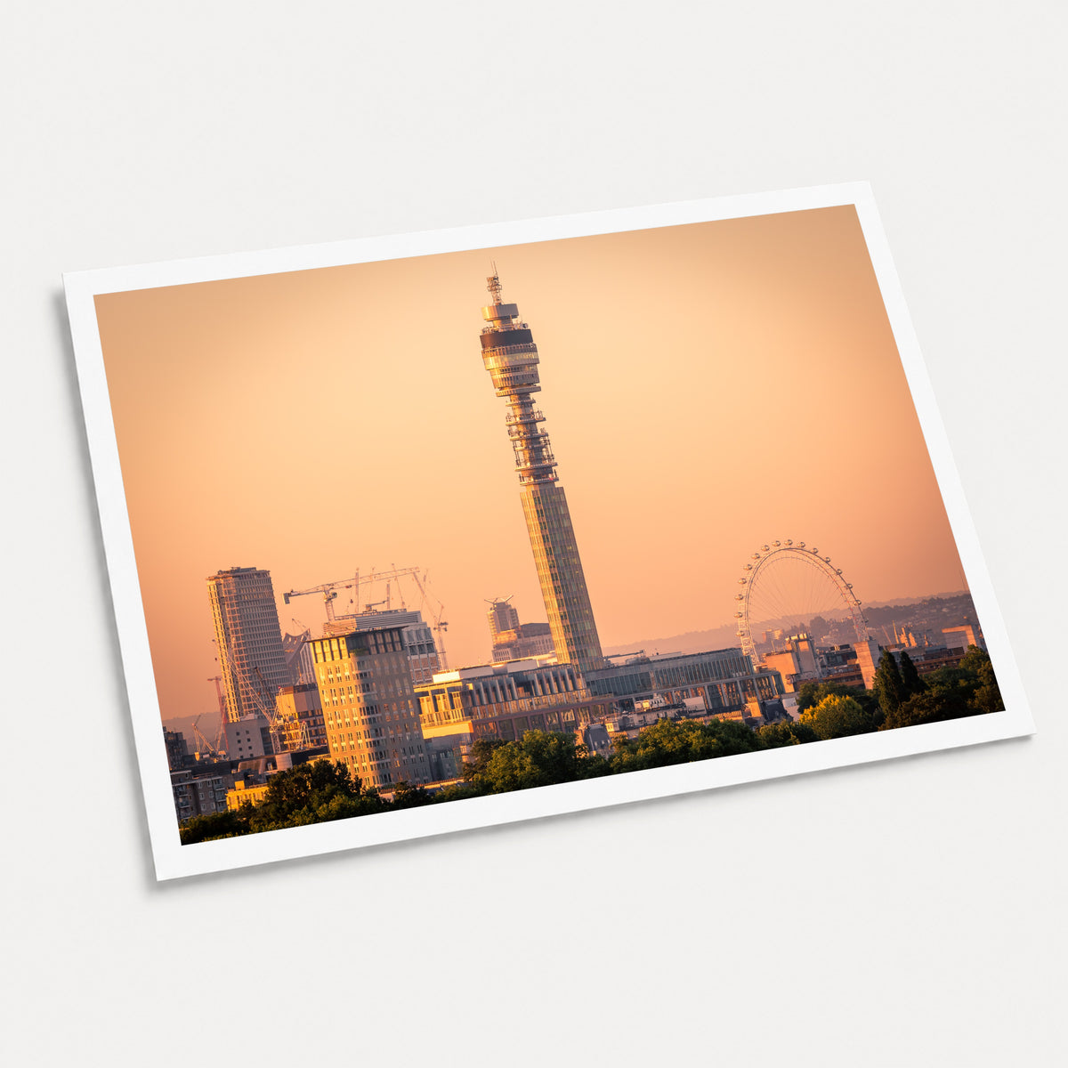 A photographic art print of London Sunrise, displayed at an angle on a light gray background.