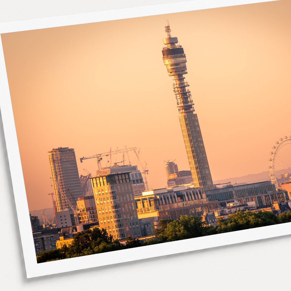A photographic print of London Sunrise, shown with a white border and angled presentation on a light background.