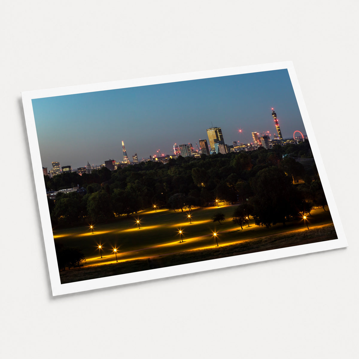 A photographic art print of Looking Over London, displayed at an angle on a light gray background.