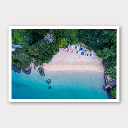 A photographic print of Mill Bay, framed with a white border and shown against a light gray background.