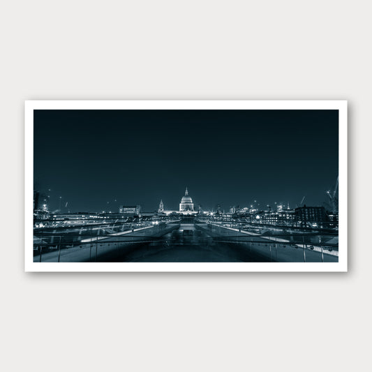 A black and white photographic print of Millennium Bridge, framed with a white border and shown against a light gray background.