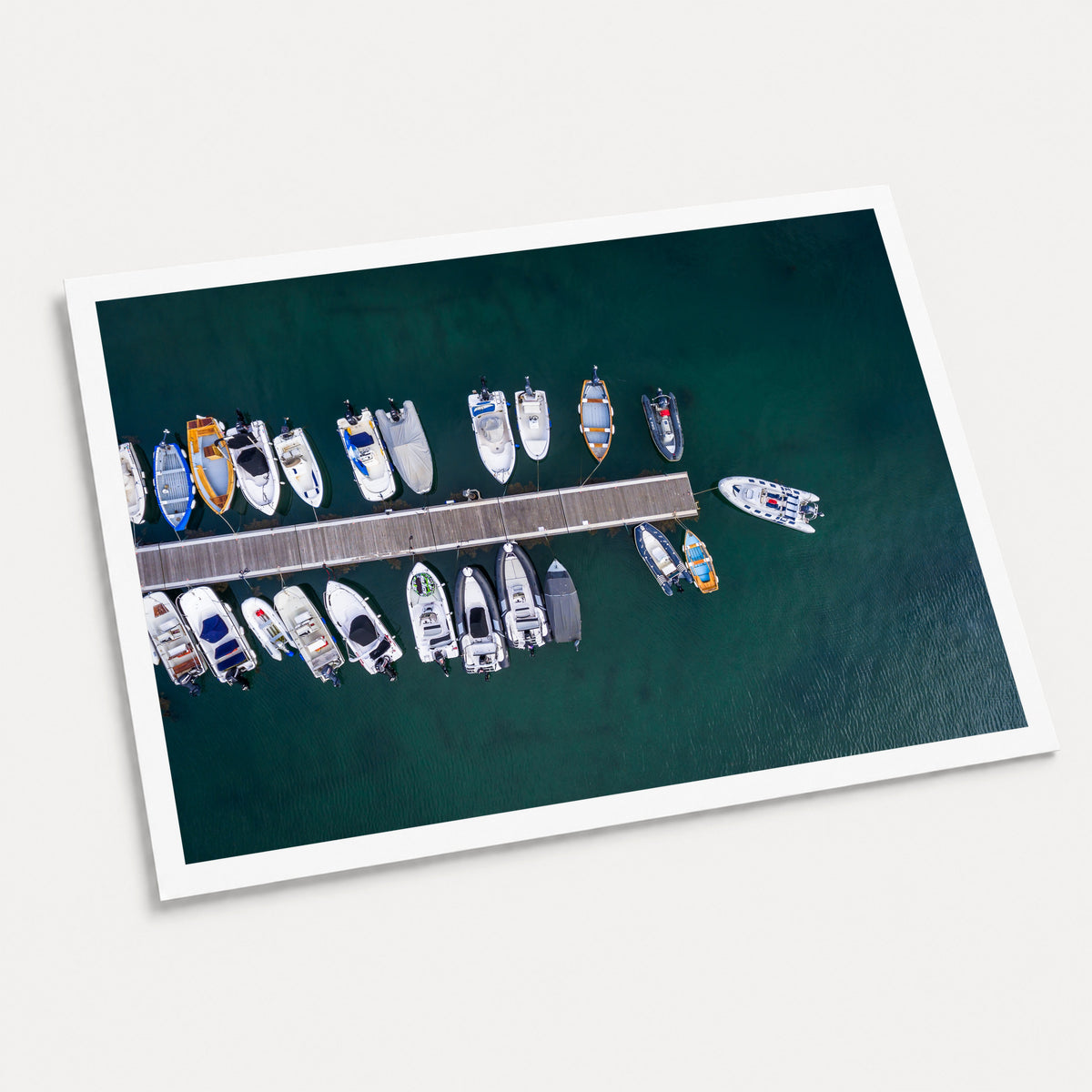 A photographic art print of Mooring Spot, displayed at an angle on a light gray background.