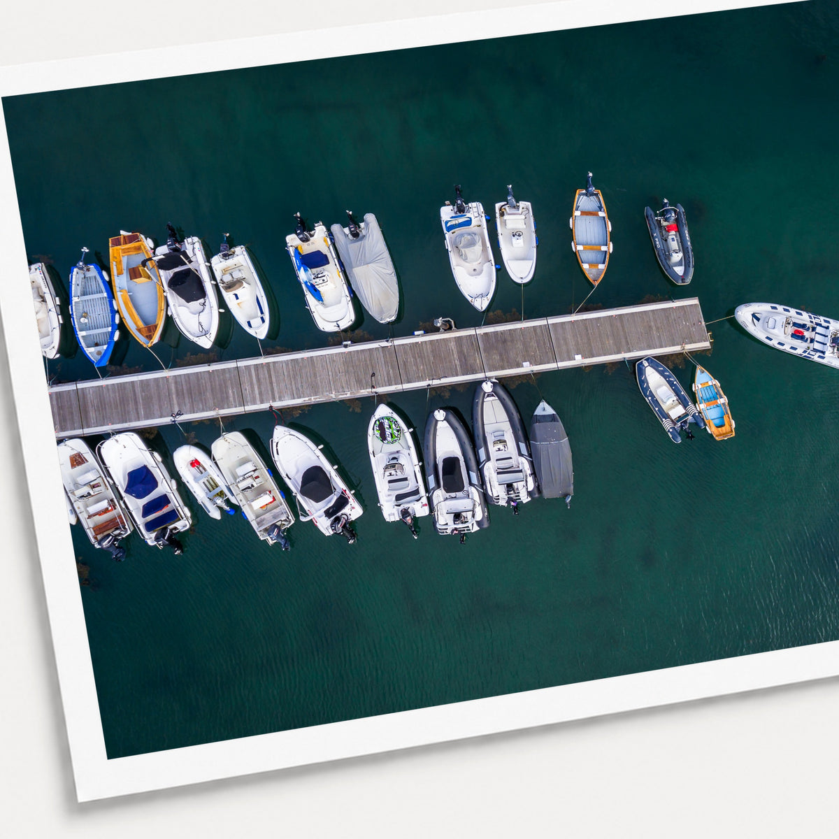 A photographic print of Mooring Spot, shown with a white border and angled presentation on a light background.