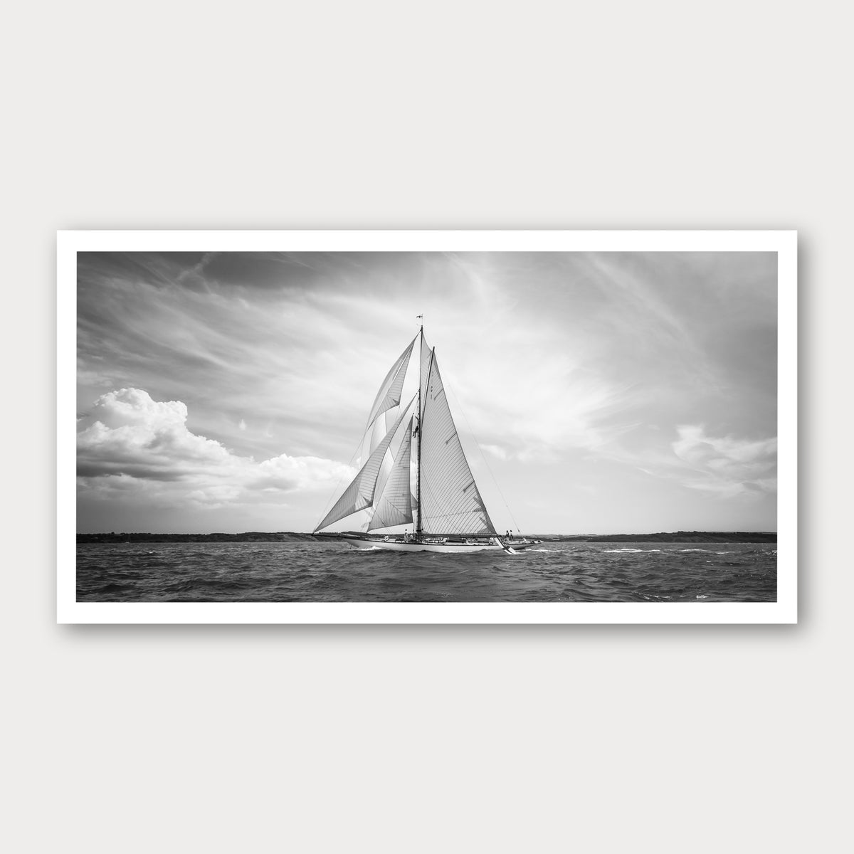 A black and white photographic print of Plain Sailing, framed with a white border and shown against a light gray background.