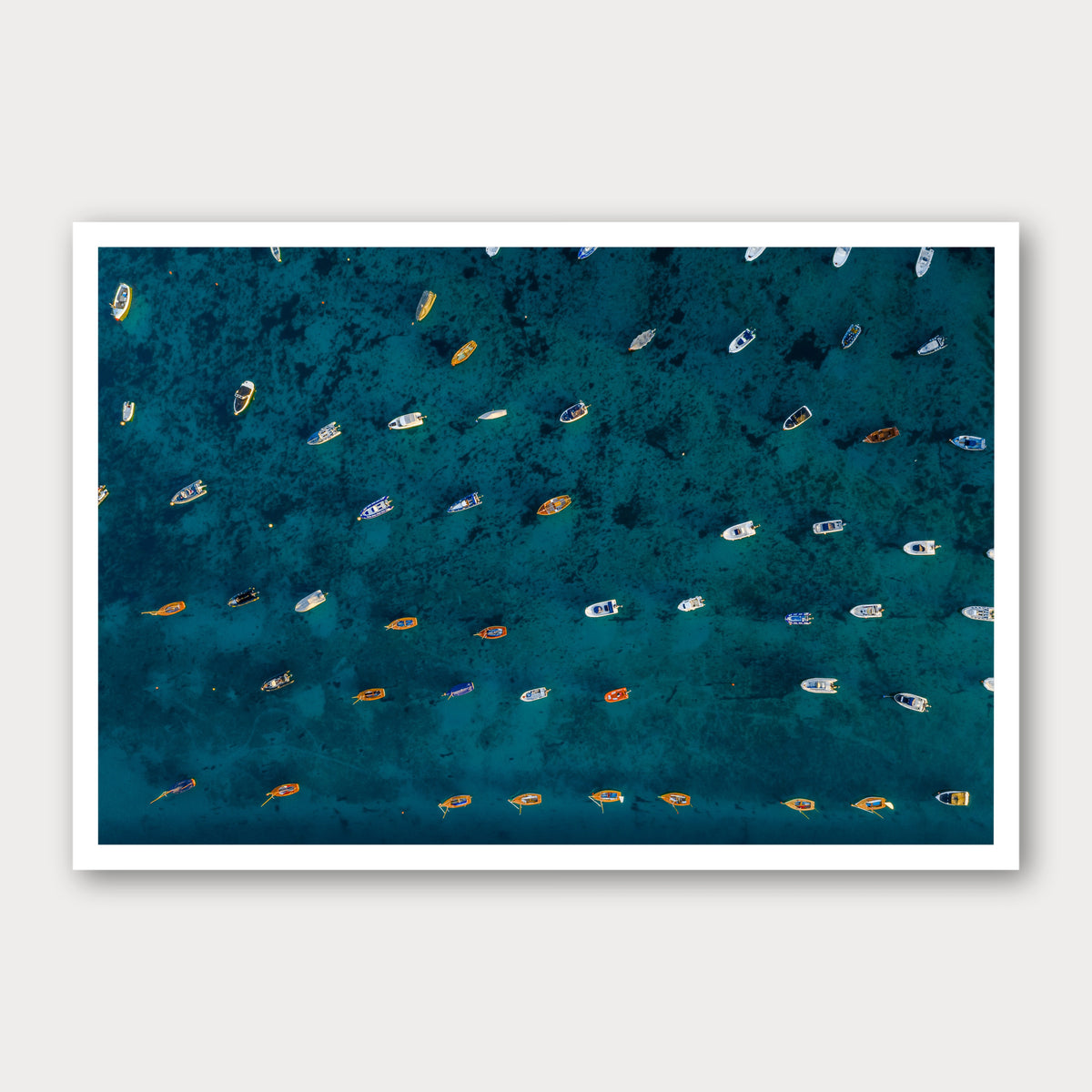A photographic print of Rising Tide, framed with a white border and shown against a light gray background.