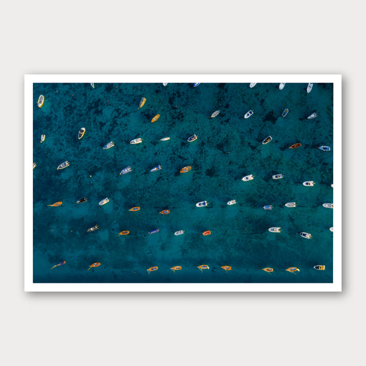 A photographic print of Rising Tide, framed with a white border and shown against a light gray background.