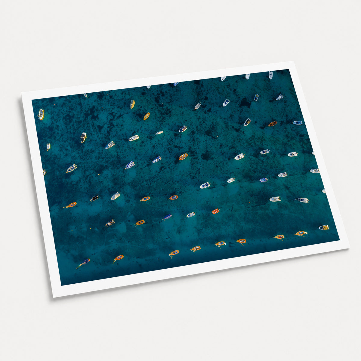 A photographic art print of Rising Tide, displayed at an angle on a light gray background.