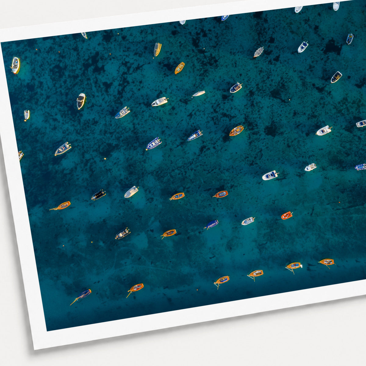 A photographic print of Rising Tide, shown with a white border and angled presentation on a light background.