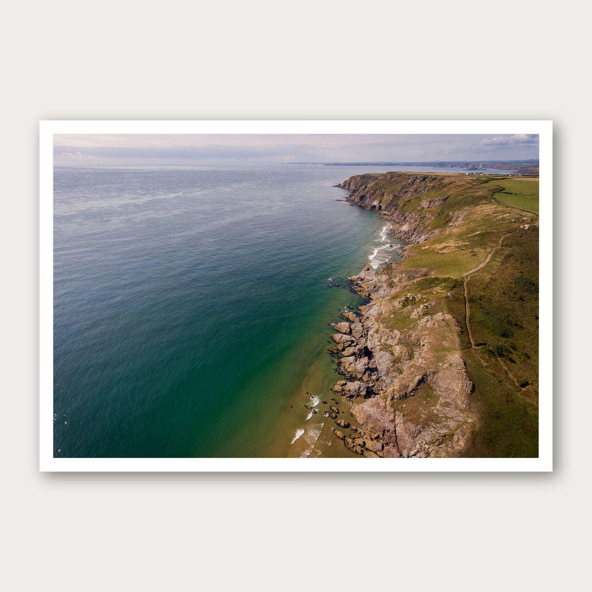 A photographic print of Salcombe Coastline, framed with a white border and shown against a light gray background.