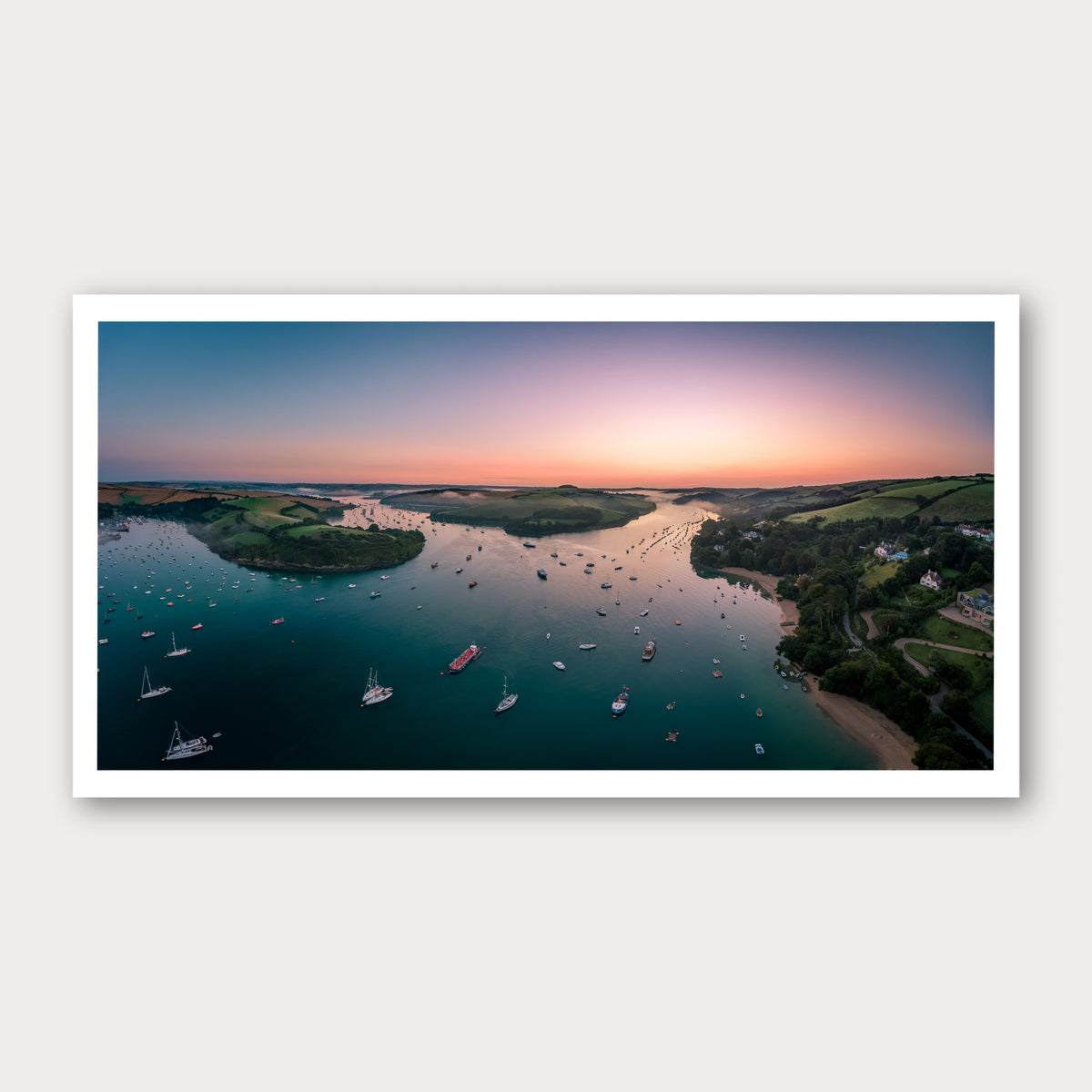 A photographic print of Snapes Point First Light, framed with a white border and shown against a light gray background.