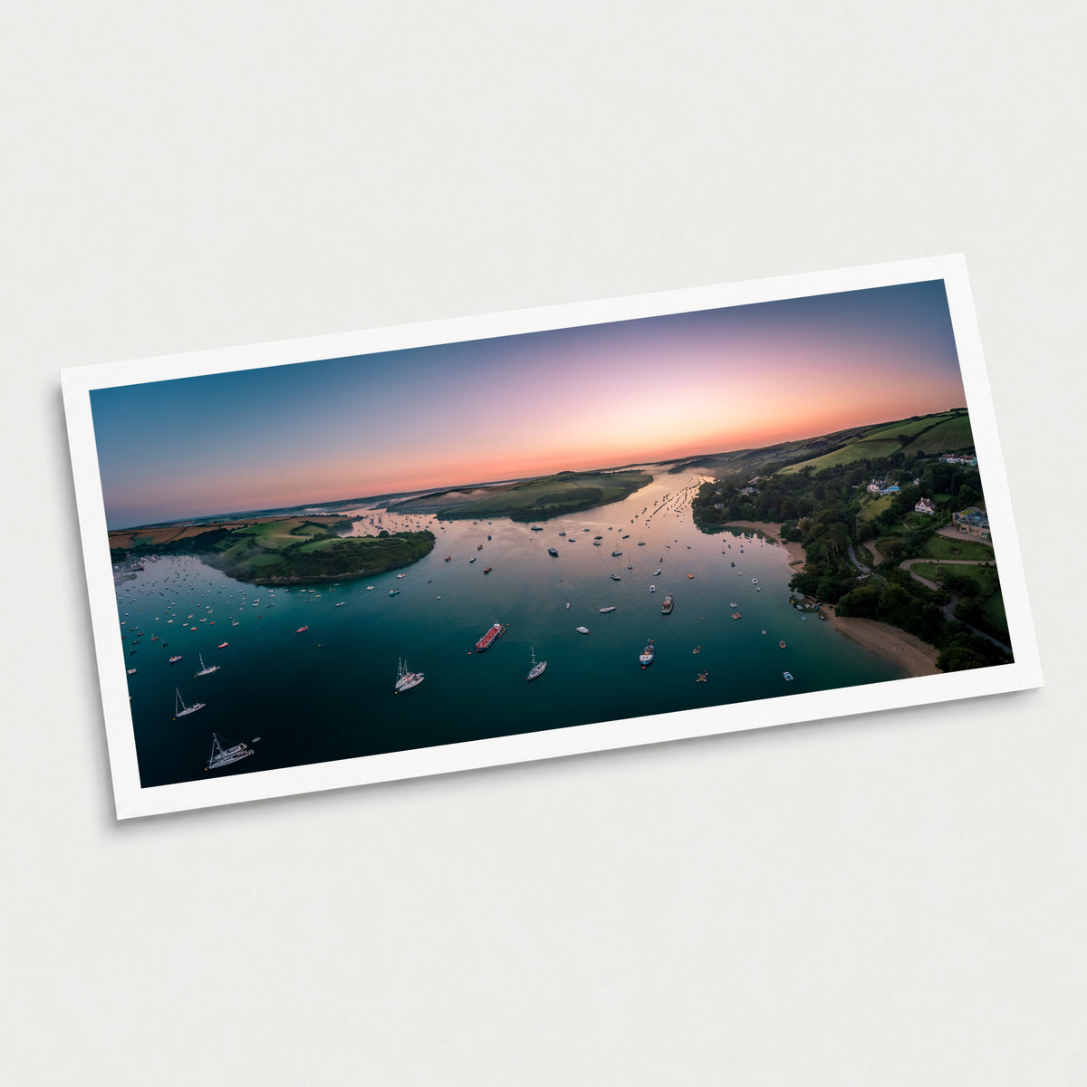 A photographic art print of Snapes Point First Light, displayed at an angle on a light gray background.