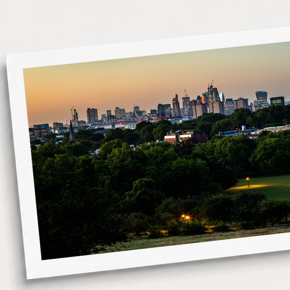 A photographic print of Square Mile, shown with a white border and angled presentation on a light background.