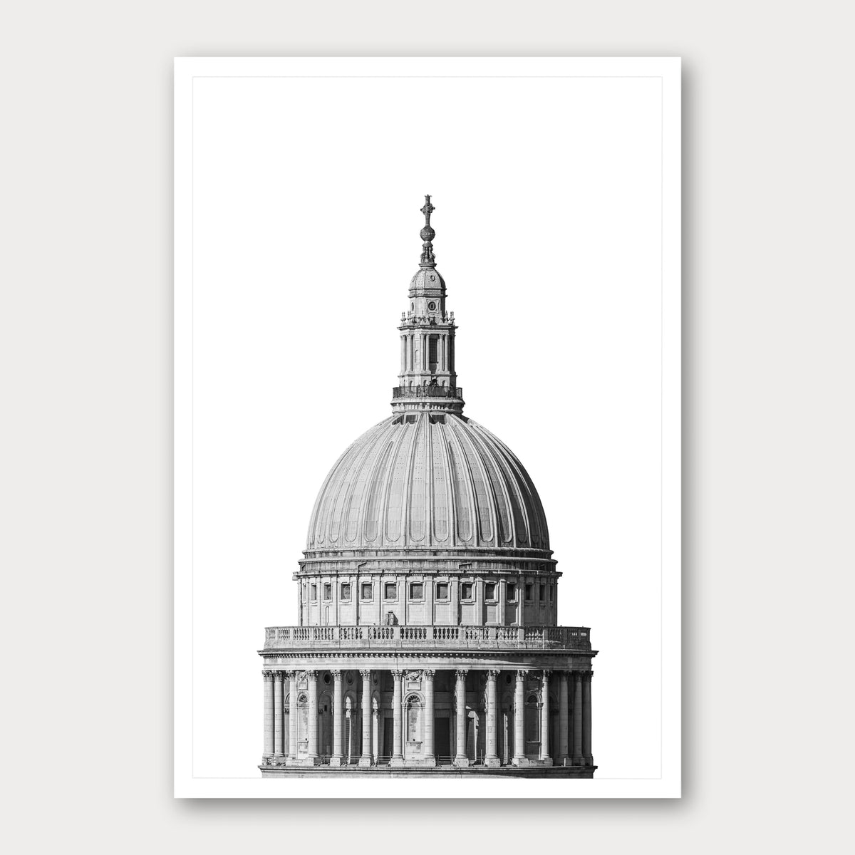 A black and white photographic print of St Paul's Cathedral, framed with a white border and shown against a light gray background.