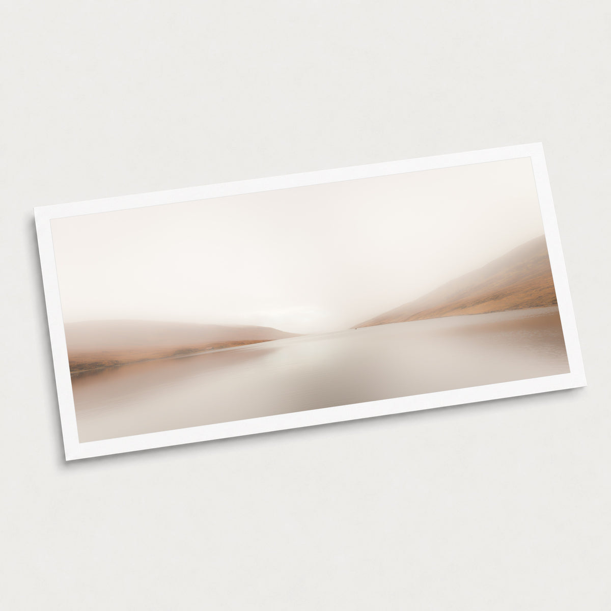 A photographic art print of Stillwater, displayed at an angle on a light gray background.