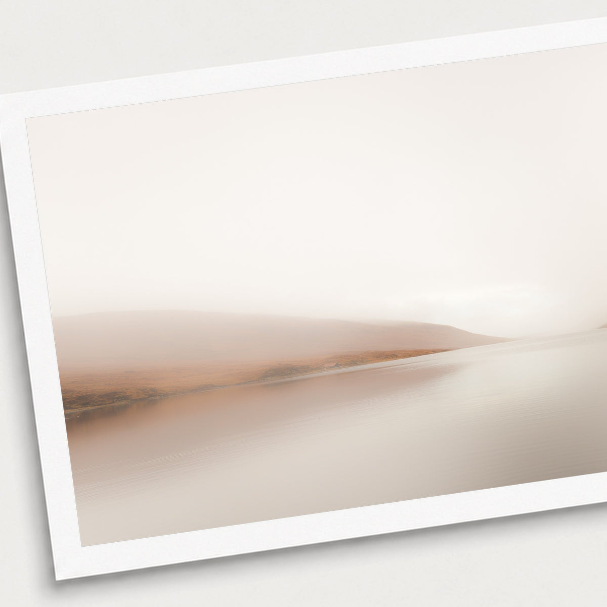 A photographic print of Stillwater, shown with a white border and angled presentation on a light background.