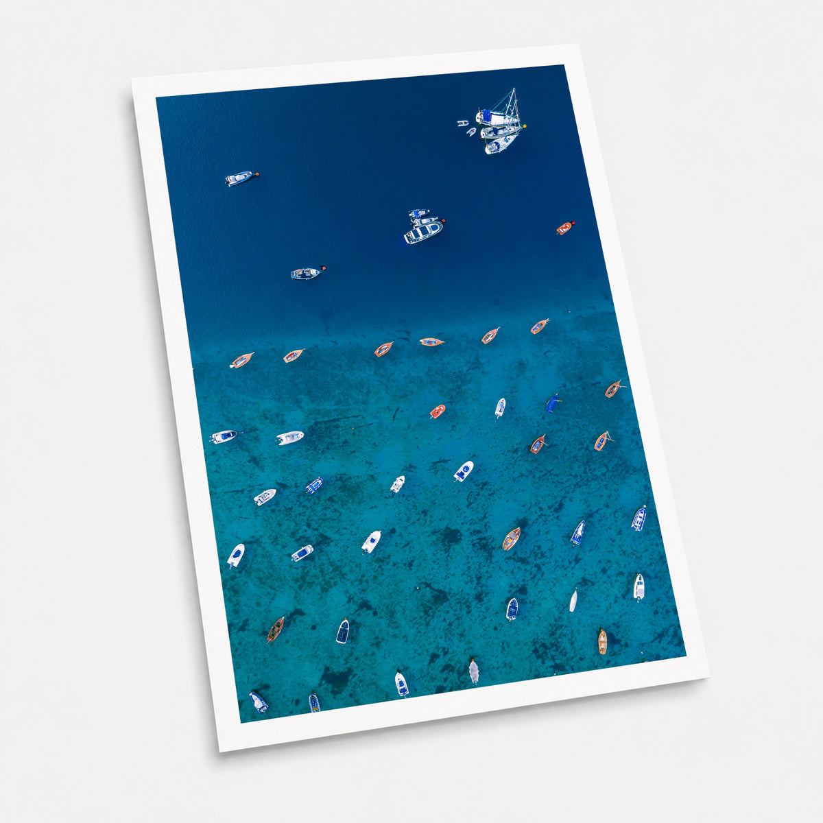 A photographic art print of Teetering on the Edge, displayed at an angle on a light gray background.