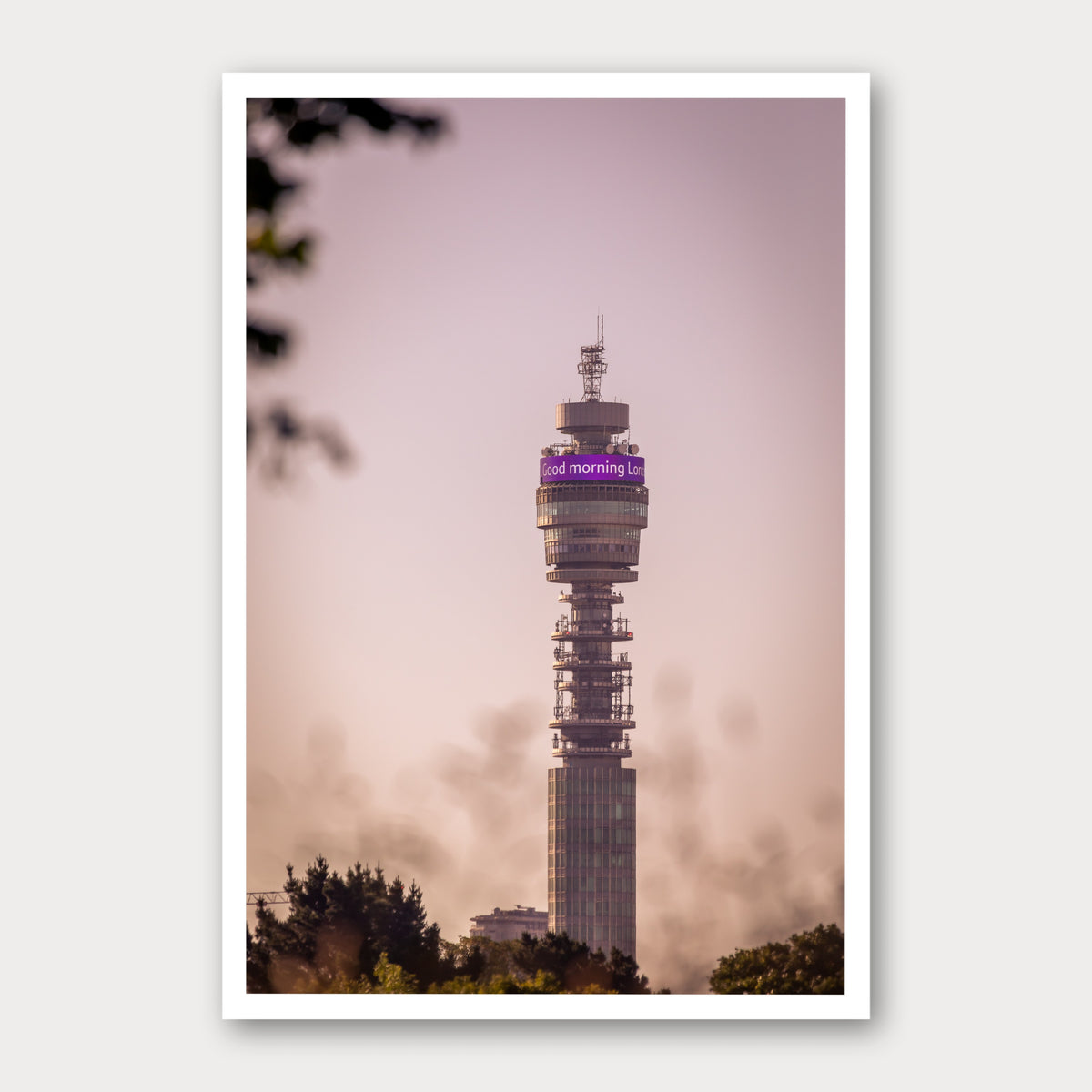 A photographic print of The BT Tower at Dawn, framed with a white border and shown against a light gray background.