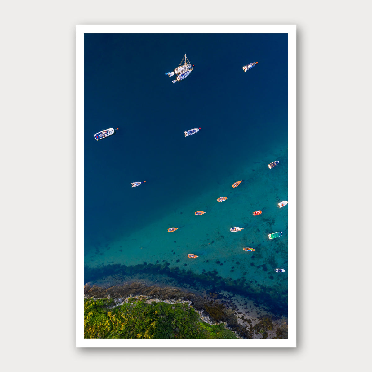 A photographic print of The Divide, framed with a white border and shown against a light gray background.
