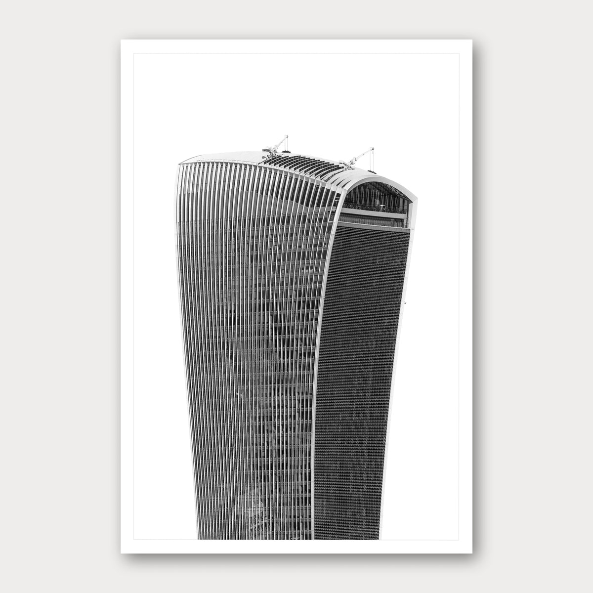 A black and white photographic print of The Walkie Talkie, framed with a white border and shown against a light gray background.
